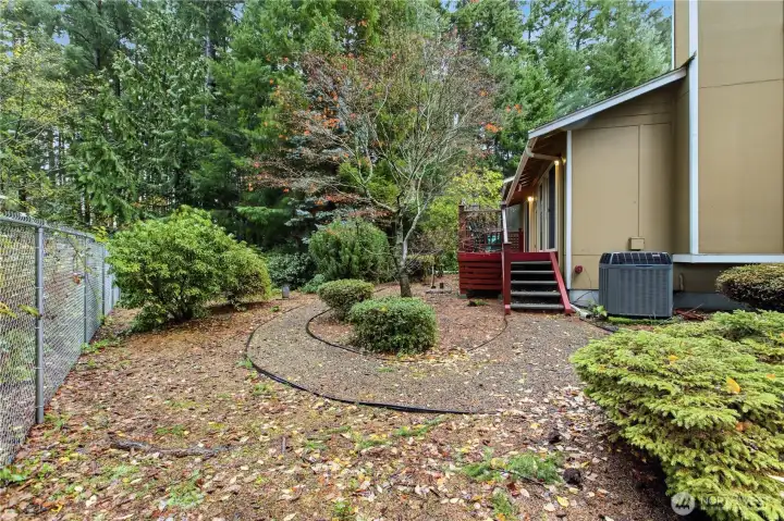 Side yard view... this is an end unit with no neighbor on the west side for privacy!