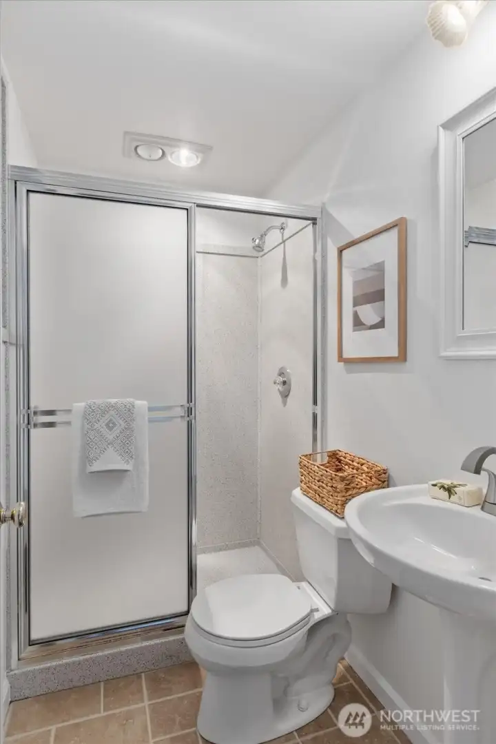 Three-quarter bathroom in basement