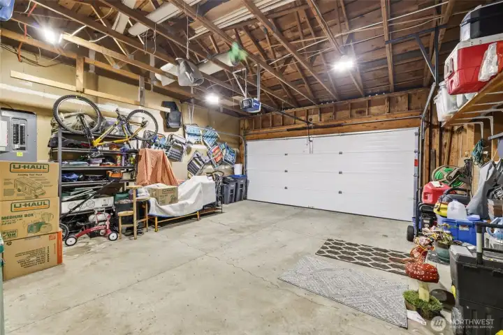 Huge 2 car garage with high ceilings.