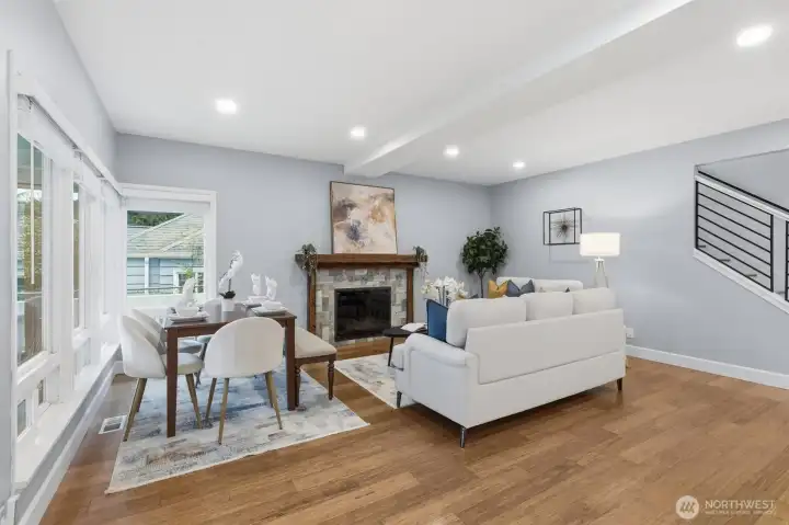 Cozy gas fireplace with bright, inviting living space