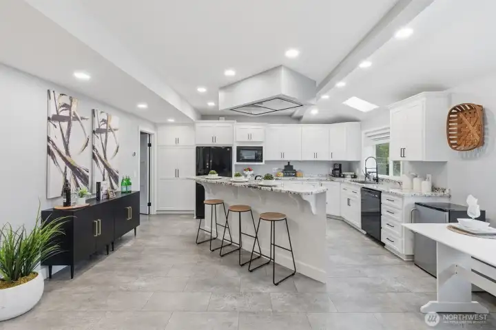 Updated kitchen with large island and breakfast bar