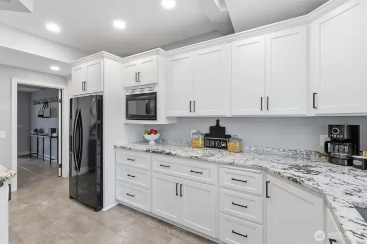 Soft-close solid wood cabinetry and modern finishes