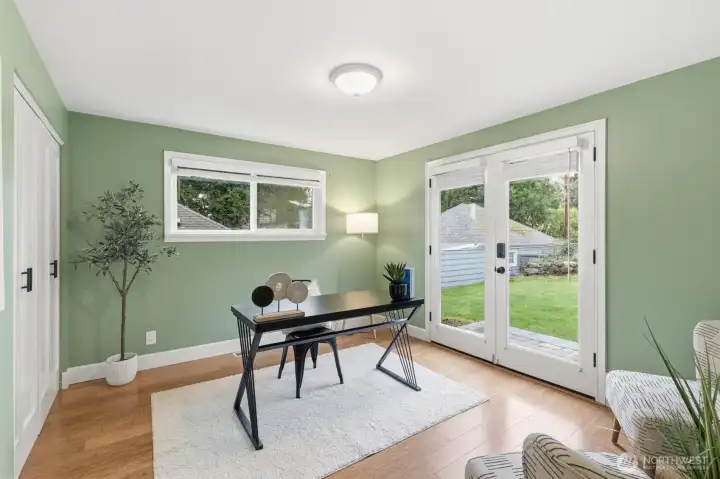 Bedroom 1 (Main Floor): Flexible main floor room ideal for office or guest space