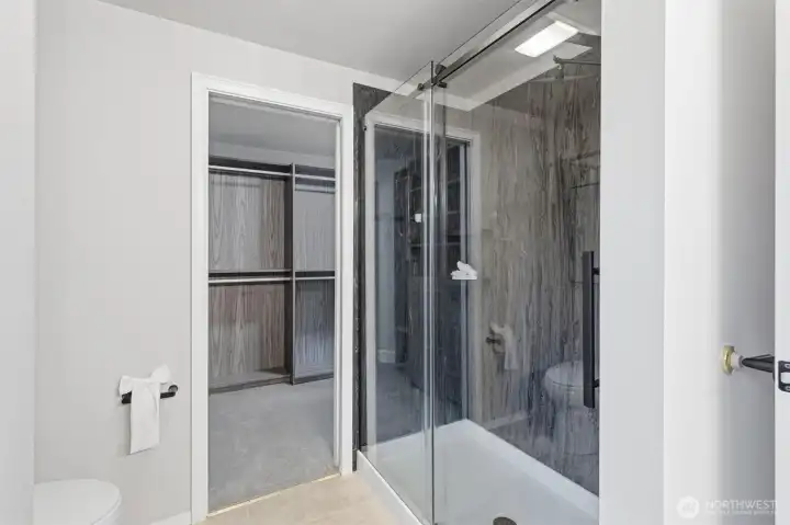 Walk-in shower with modern tile surround