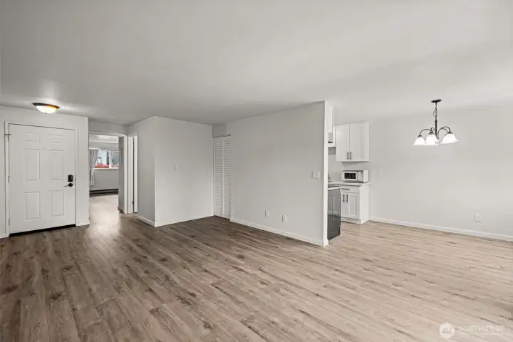 Another view of the living room and dining room.