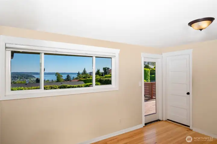 Primary bedroom - glass door to deck and 2nd door to 3/4 bath Primary bedroom - glass door to deck and 2nd door to 3/4 bath