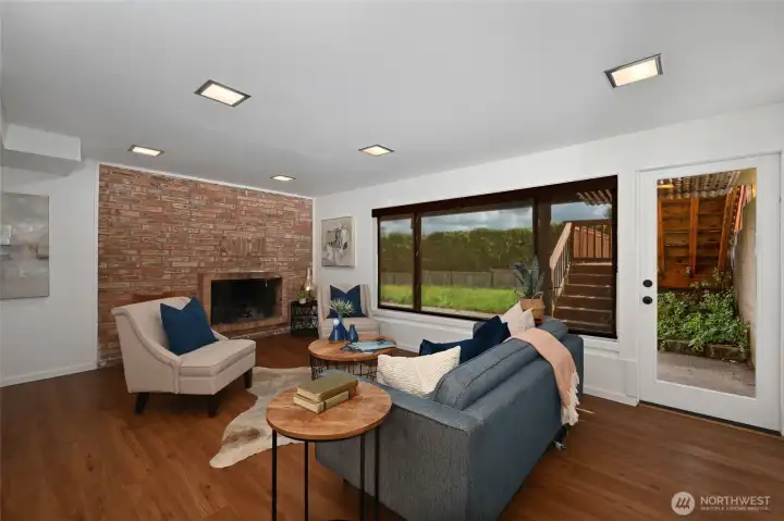 Lower level rec room with wood burning fireplace Lower level rec room with wood burning fireplace