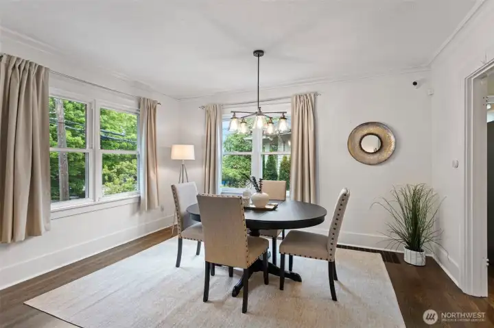 Abundant natural light and seamless access to the kitchen create a bright, inviting dining area that is both comfortable and functional for everyday living.