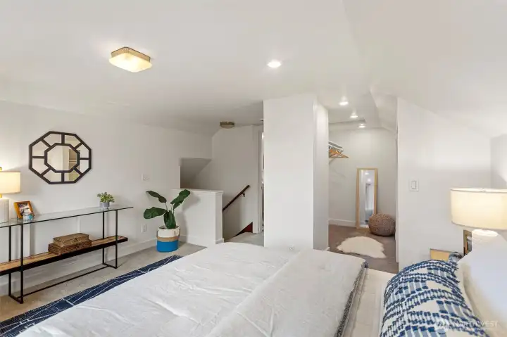 The upper level is dedicated to the primary with walk-in closet and ensuite bathroom. Both bedroom and bathroom are very spacious.