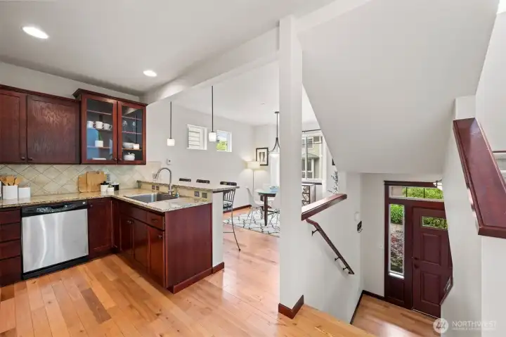 This home features three floors and an attached garage.