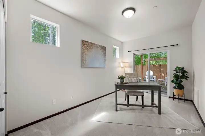 Lower level bedroom can be a den, office, playroom or hobby room. Easy access to backyard too!