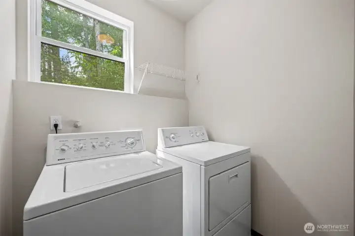 Full size laundry room on lower level and washer & dryer stay!