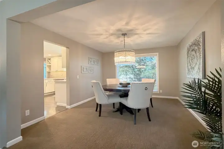 Dining room with Restoration Hardware chandelier.