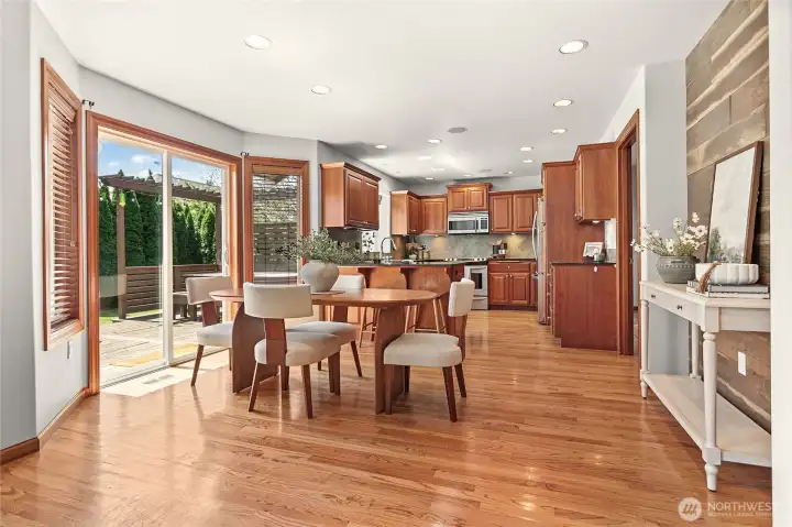 Sliding glass patio door leads to huge deck area with custom built-in seating area, your own hot tub and lower patio Sliding glass patio door leads to huge deck area with custom built-in seating area, your own hot tub and lower patio