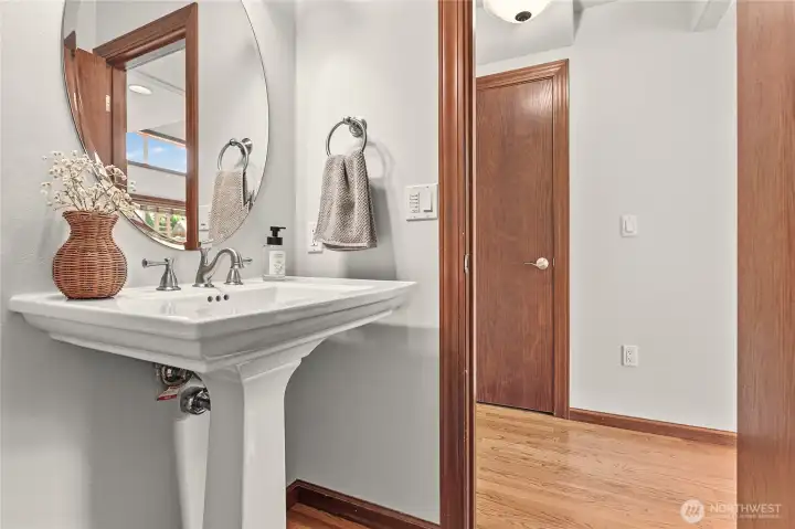 1/2 bathroom tucked between office/den & kitchen 1/2 bathroom tucked between office/den & kitchen