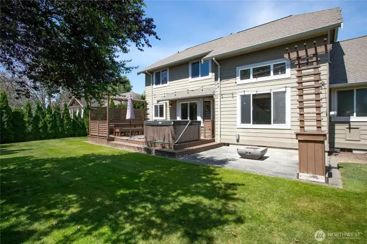 Just look at all of that entertainment space ready for you! Large custom deck, hot tub, built-in gas fireplace, and large paver patio Just look at all of that entertainment space ready for you! Large custom deck, hot tub, built-in gas fireplace, and large paver patio