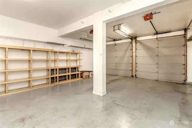 Oversized 2 car garage w/ storage shelves