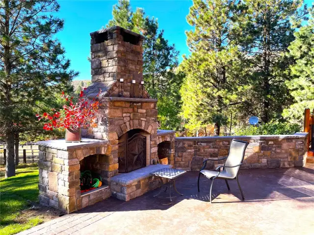 Dual-fuel fireplace & outdoor living at its finest. 1000-GAL underground propane tank feed all of the outdoor gas appliances.