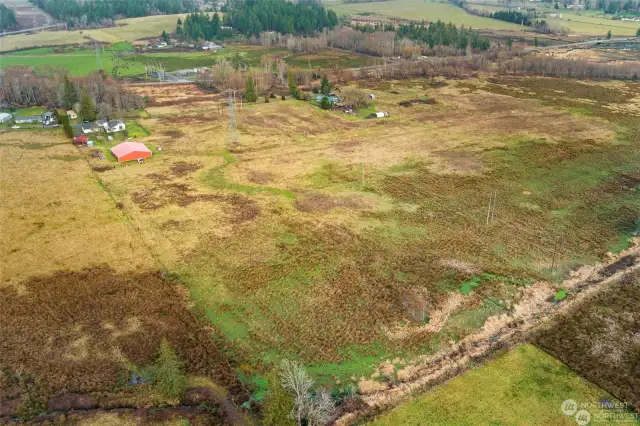 Aerial view looking northwest. You can see the mouth of Quilcene Bay in the upper right