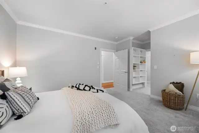 Primary bedroom into walk-in closet and bathroom