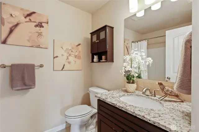 Shared upstairs full bathroom between bedrooms 3 & 4.