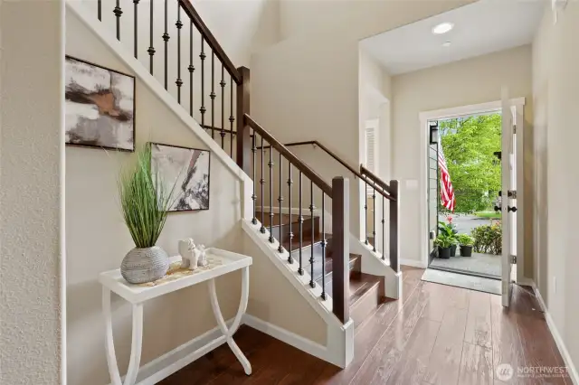 Designer entry- guest half bath to the left.