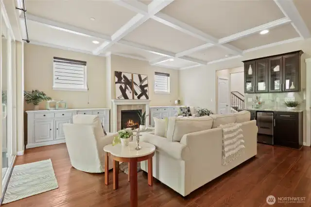 A wow experience! Tray ceilings, Fireplace, engineered wood floors & more! White matching sideboards available for purchase- ask for the price sheet.