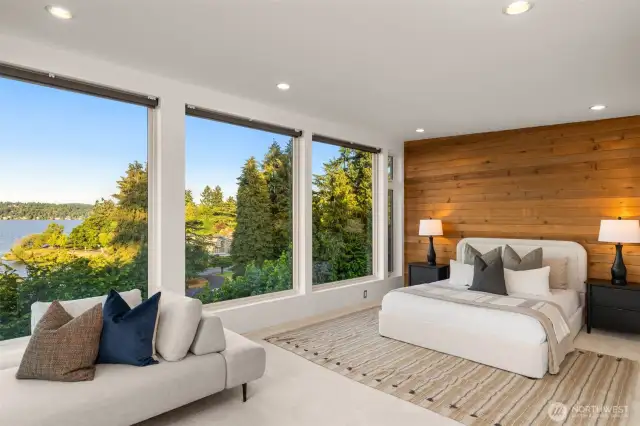 The primary bedroom features new carpet, an oversized 5-bath suite, french doors, custom walk-in-closet and a slider out to the expansive deck.