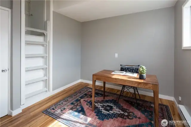 This room is back off the laundry room and has access to the attic.