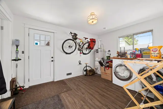 The laundry room is very large and opens to the rear yard and carport.