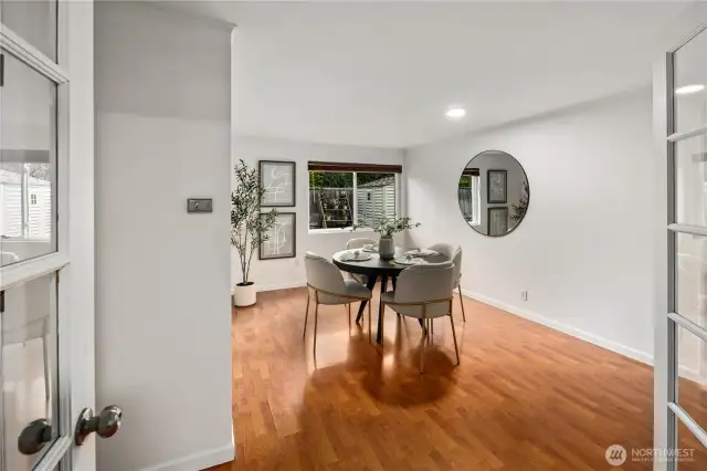 French doors open to a bonus room off of the kitchen, providing endless opportunities - a formal dining room, home office, gym, or playroom!