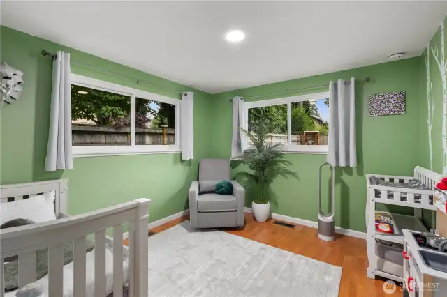 The second bedroom is well-sized and features two windows