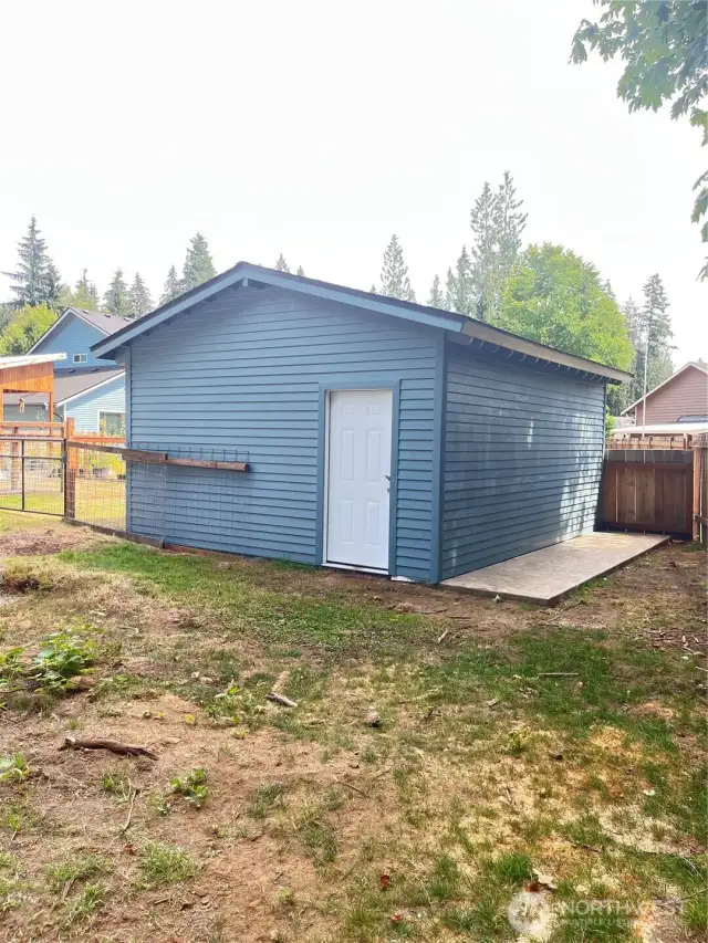 This is a new workshop at the back of the property.  Just under 400sf, it has two entrances, one from the second driveway, one from the backyard.