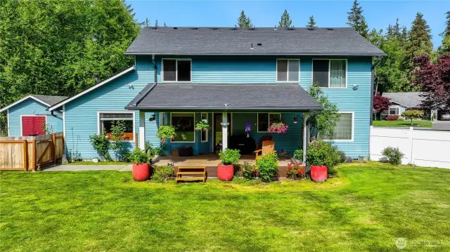 Covered back deck.  Perfect for relaxing with a beverage in the evening.