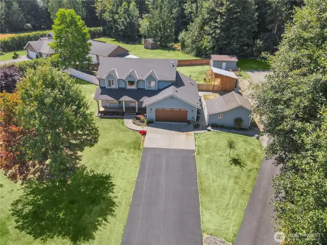 House is set back nicely from the private neighborhood road