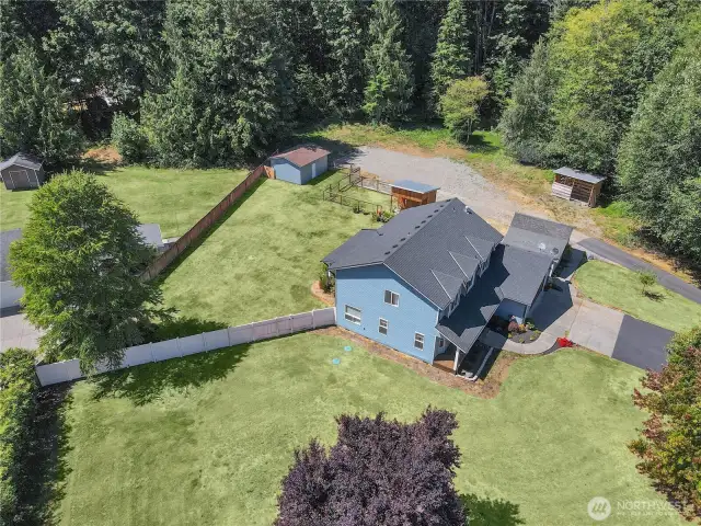 Drone shot shows front and back yards