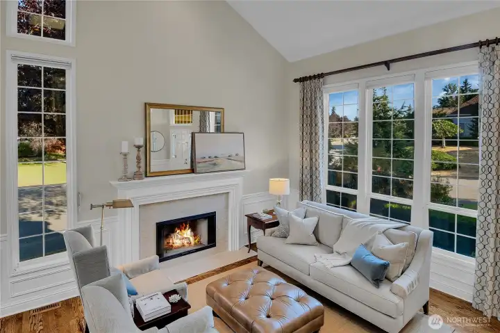 Luxurious Living Room with wood burning fireplace
