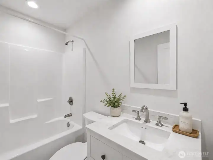 Main bathroom.  Virtually staged.