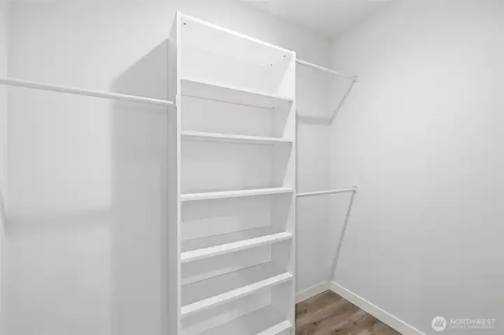 Primary walk in closet.