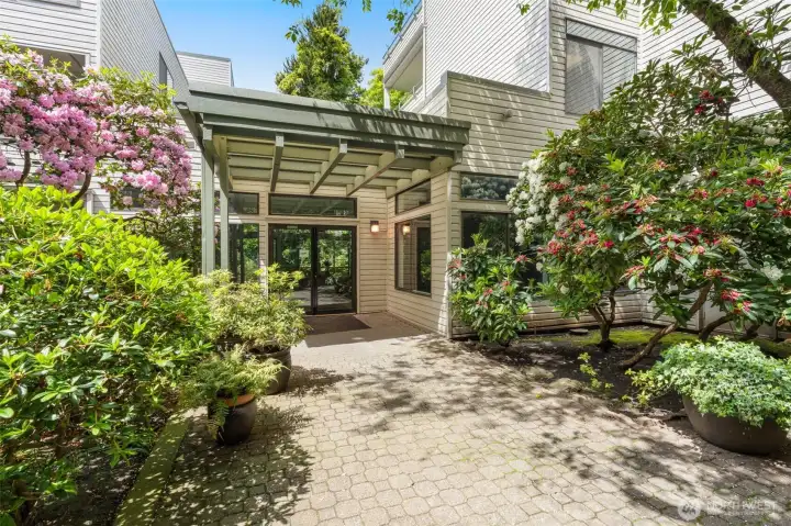 The courtyard features a bike rack.