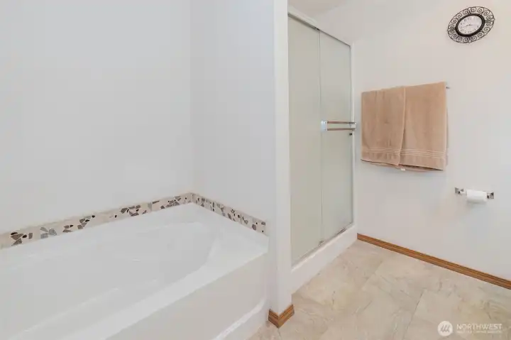 Soaker tub and shower in Primary