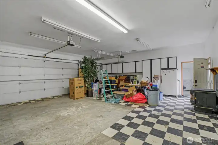 Garage - Inside w pellet stove and shop cabinets