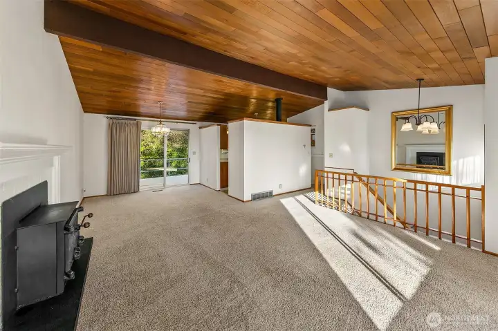 Living and dining room are open to maximize the space.  Dining is open to large slider to back deck