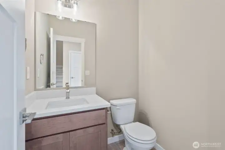 Main floor powder/ half bath for guests and convenience.