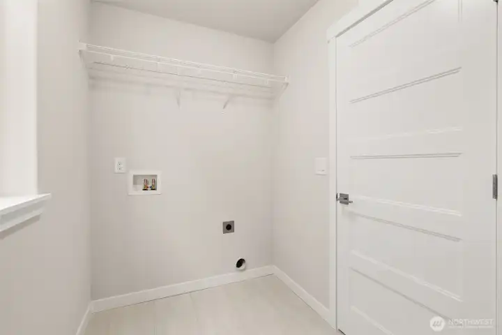 Laundry room located upstairs for convenience
