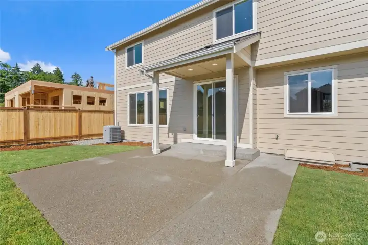 Additional outdoor living space with extended patio.
