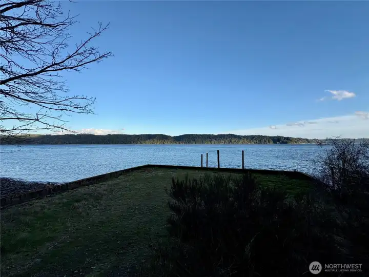 Late winter evening view of property and shoreline.