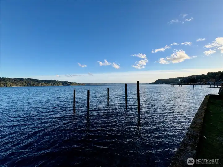 Late winter evening view of property and shoreline.