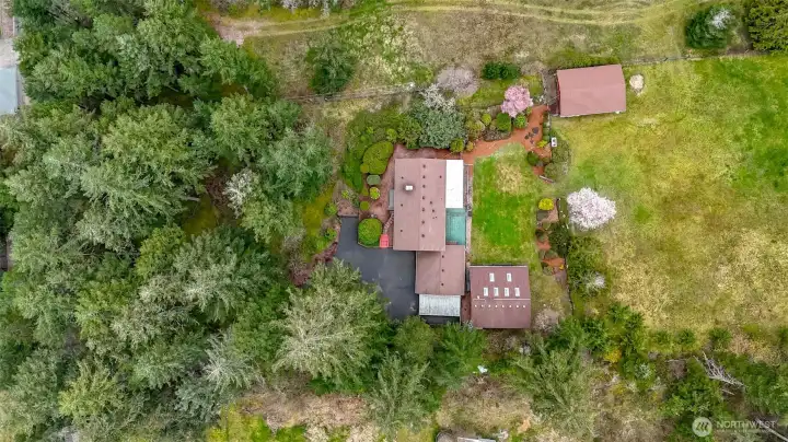 House sits on 2.4 acres and adjacent 4.8 acres available as well