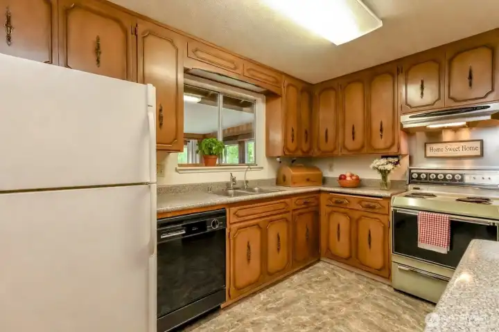 Virtually staged. Kitchen with lots of counter